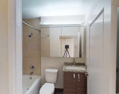 401 E 34th St - Photo Thumbnail 3