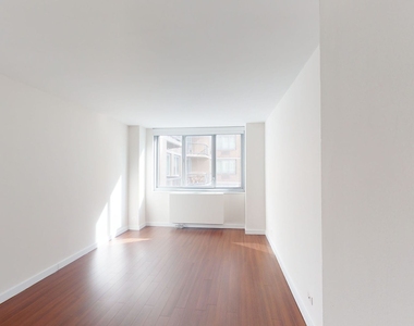 401 E 34th St - Photo Thumbnail 2