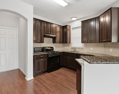5227 Brinkman Court - Photo Thumbnail 9