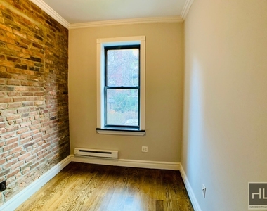 E 32nd St. - Photo Thumbnail 2