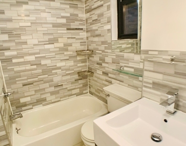 E 32nd St. - Photo Thumbnail 4
