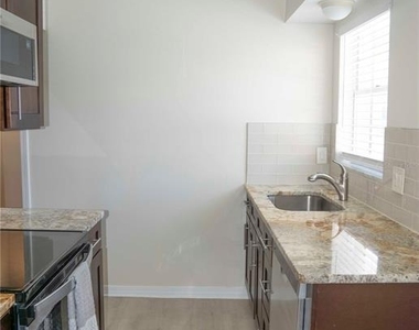 6940 A Sunset Drive S - Photo Thumbnail 8