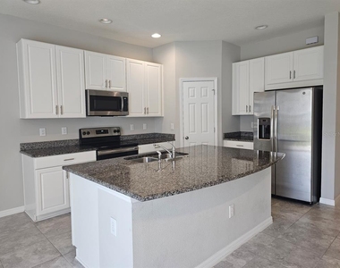 7113 Grand Elm Drive - Photo Thumbnail 5