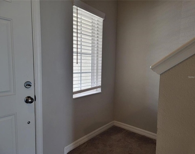 7113 Grand Elm Drive - Photo Thumbnail 2