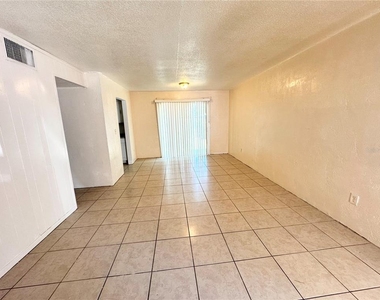 1229 Kennedy Road - Photo Thumbnail 2