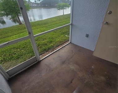 8312 Bernwood Cove Loop - Photo Thumbnail 3