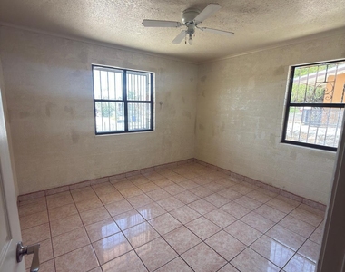 6115 Tesuque Drive - Photo Thumbnail 3