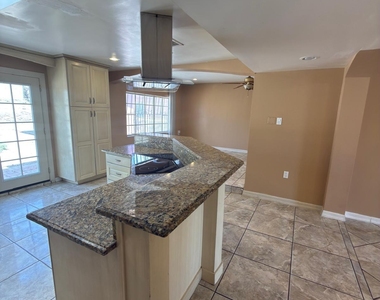 6115 Tesuque Drive - Photo Thumbnail 1