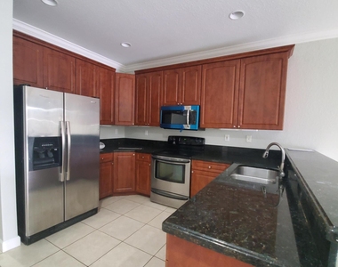 115 Akron Street - Photo Thumbnail 3