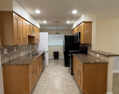 7302 Nw 57th Court - Photo Thumbnail 1