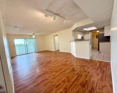 5065 Wiles Road - Photo Thumbnail 3