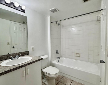 5065 Wiles Road - Photo Thumbnail 2