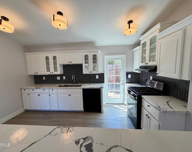 8735 E Fairview Avenue - Photo Thumbnail 8