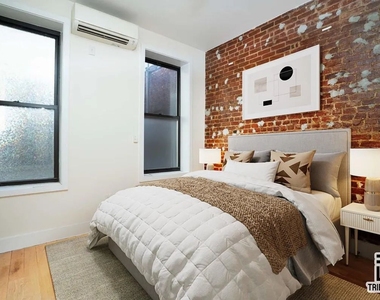 386 E 23rd Street - Photo Thumbnail 1