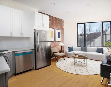 386 E 23rd Street - Photo Thumbnail 2