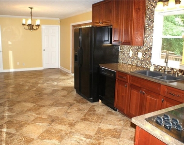 6725 Ridge Moore Drive - Photo Thumbnail 5