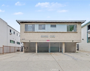 1037 N Curson - Photo Thumbnail 1