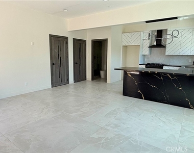 16015 Acre St - Photo Thumbnail 2