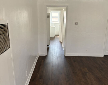 1052 W 60th Place - Photo Thumbnail 2