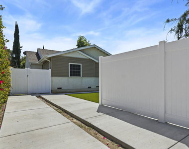 13842 Hamlin Street - Photo Thumbnail 2