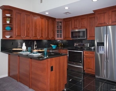 5000 Townhouse Drive - Photo Thumbnail 2