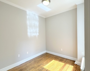 E 13th St. - Photo Thumbnail 2