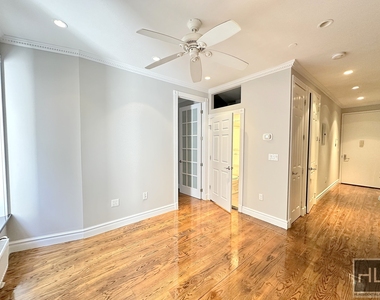 E 13th St. - Photo Thumbnail 1