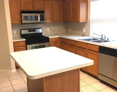 9837 Meadow Rue Drive - Photo Thumbnail 3