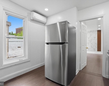 250 E Girard Avenue - Photo Thumbnail 1