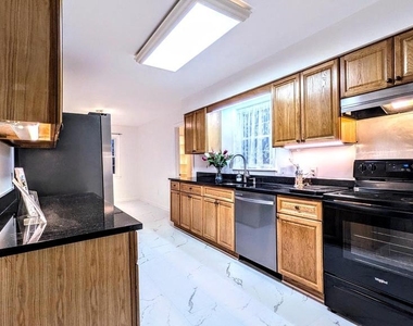 8835 Tuckerman Lane - Photo Thumbnail 8