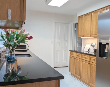 8835 Tuckerman Lane - Photo Thumbnail 7