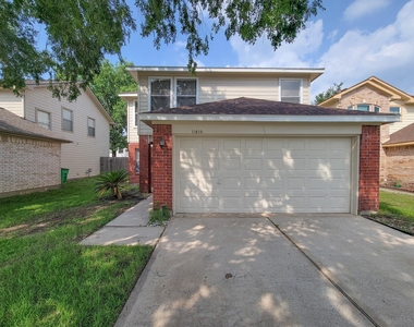 11810 Rolling Stream Drive - Photo Thumbnail 1