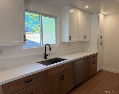 7101 Fallbrook Avenue - Photo Thumbnail 3