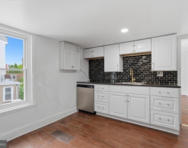 250 E Girard Avenue - Photo Thumbnail 1
