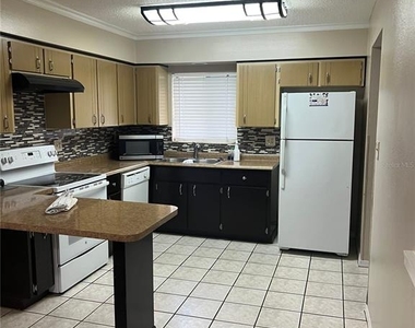 2777 N Poinciana Boulevard - Photo Thumbnail 3