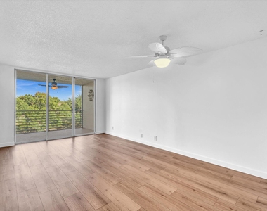9470 Poinciana Place - Photo Thumbnail 3