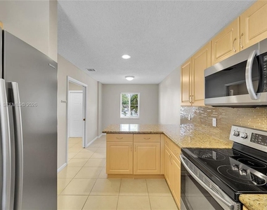 9840 Nw 19th Place - Photo Thumbnail 3