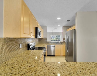 9840 Nw 19th Place - Photo Thumbnail 2