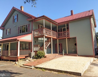 9014 Sudley Road - Photo Thumbnail 4