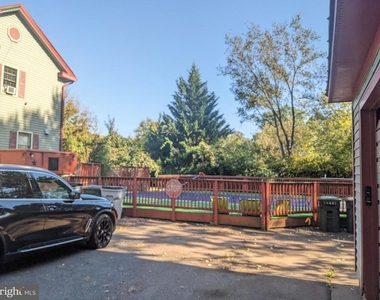 9014 Sudley Road - Photo Thumbnail 2