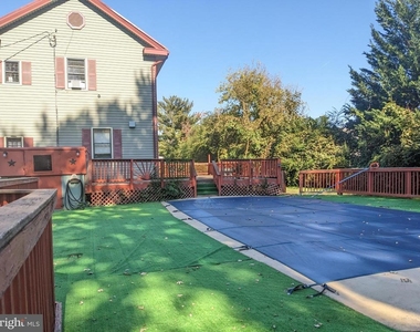 9014 Sudley Road - Photo Thumbnail 1