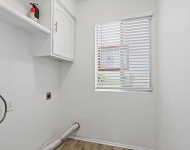 6803 Woodhue Dr - Photo Thumbnail 6