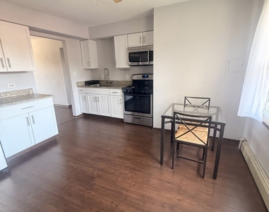 7601 Banks Street - Photo Thumbnail 1
