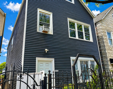 2114 W 51st Street - Photo Thumbnail 1