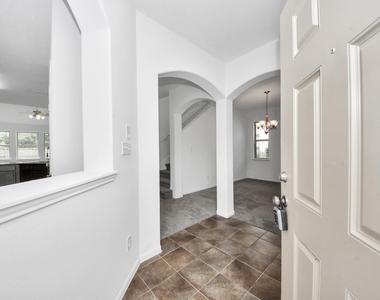 10606 Sun River Falls Drive - Photo Thumbnail 2