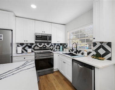 1433 S Belcher Road - Photo Thumbnail 3