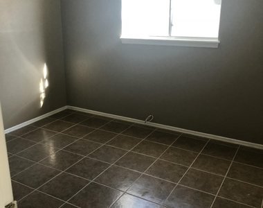 8614 Mettler Drive - Photo Thumbnail 3