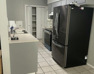 8614 Mettler Drive - Photo Thumbnail 1