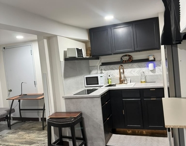 6816 Avenue L - Photo Thumbnail 1
