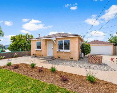 3103 N Olive Avenue - Photo Thumbnail 1